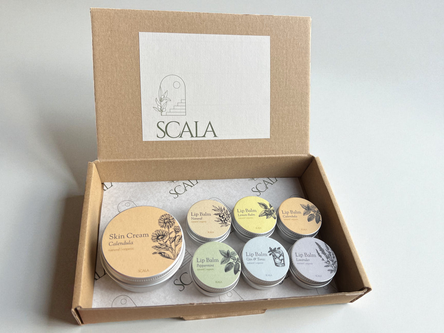 Confezione regalo deluxe - 6 balsami per le labbra + crema per la pelle