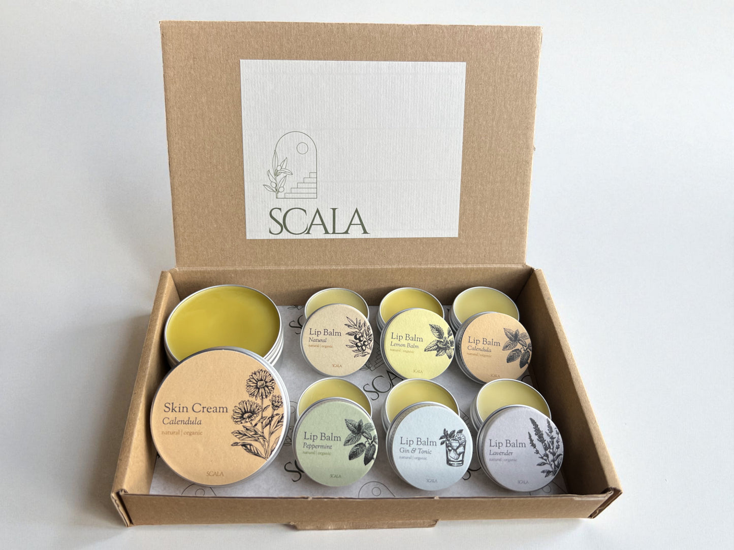 Confezione regalo deluxe - 6 balsami per le labbra + crema per la pelle